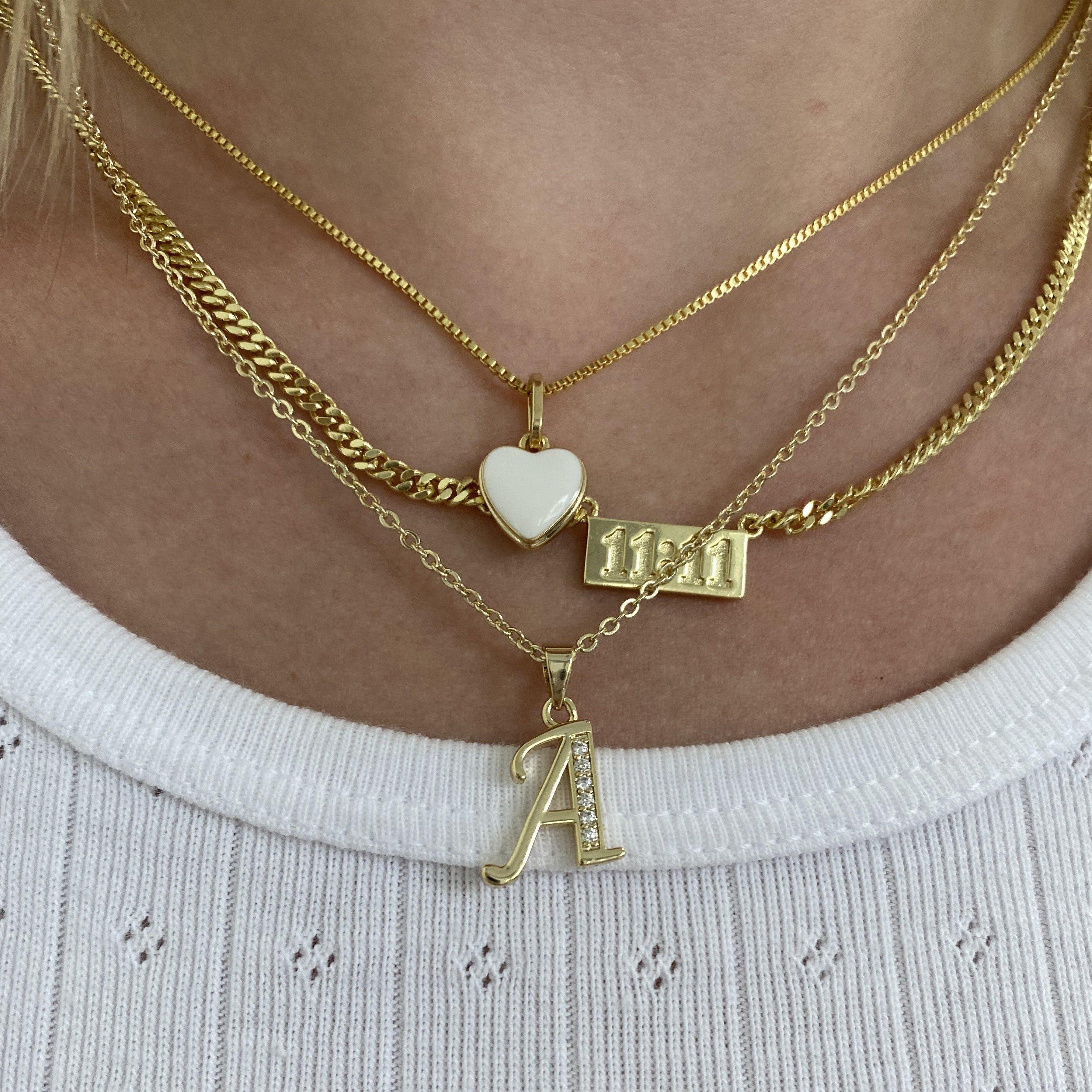 Love actually gold heart on sale necklace